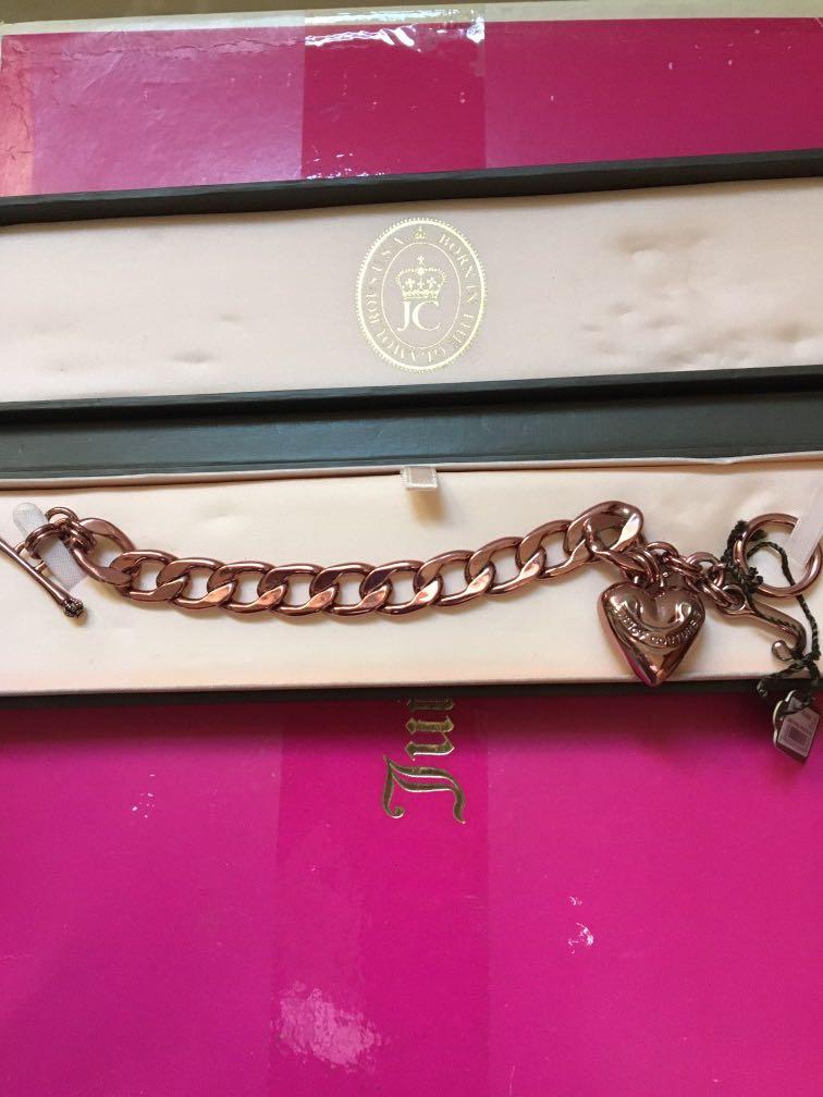 Juicy Couture bracelet (Category: Bracelets) located in Antipolo. Submitted by shopitsmeanttobe (Listing ID 278758234, Image 2). Description: Juicy couture pink bracelet flaw: ung pink na color nya some parts nag tarnish na pero di nmn halata kc mettalic pwede nyo din spary ng bagong color na gusto nyo :).