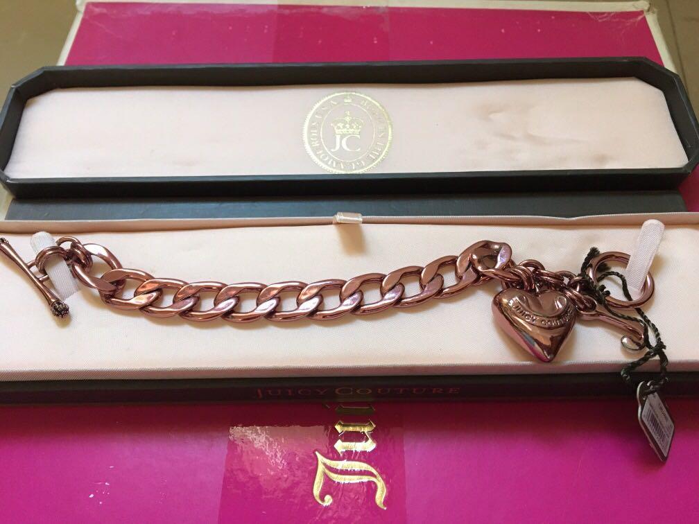 Juicy Couture bracelet (Category: Bracelets) located in Antipolo. Submitted by shopitsmeanttobe (Listing ID 278758234, Image 3). Description: Juicy couture pink bracelet flaw: ung pink na color nya some parts nag tarnish na pero di nmn halata kc mettalic pwede nyo din spary ng bagong color na gusto nyo :).