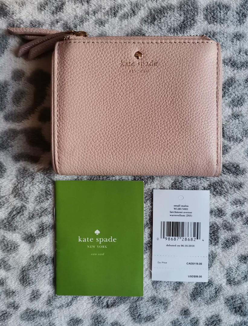 Kate Spade Malea wallet (Category: Wallets & Card holders) located in Paranaque City. Submitted by kgcbien (Listing ID 278846943, Image 1). Description: Kate Spade Malea wallet in warmvellum condition: 7/10 (please see picture for the issues) very good in actual.