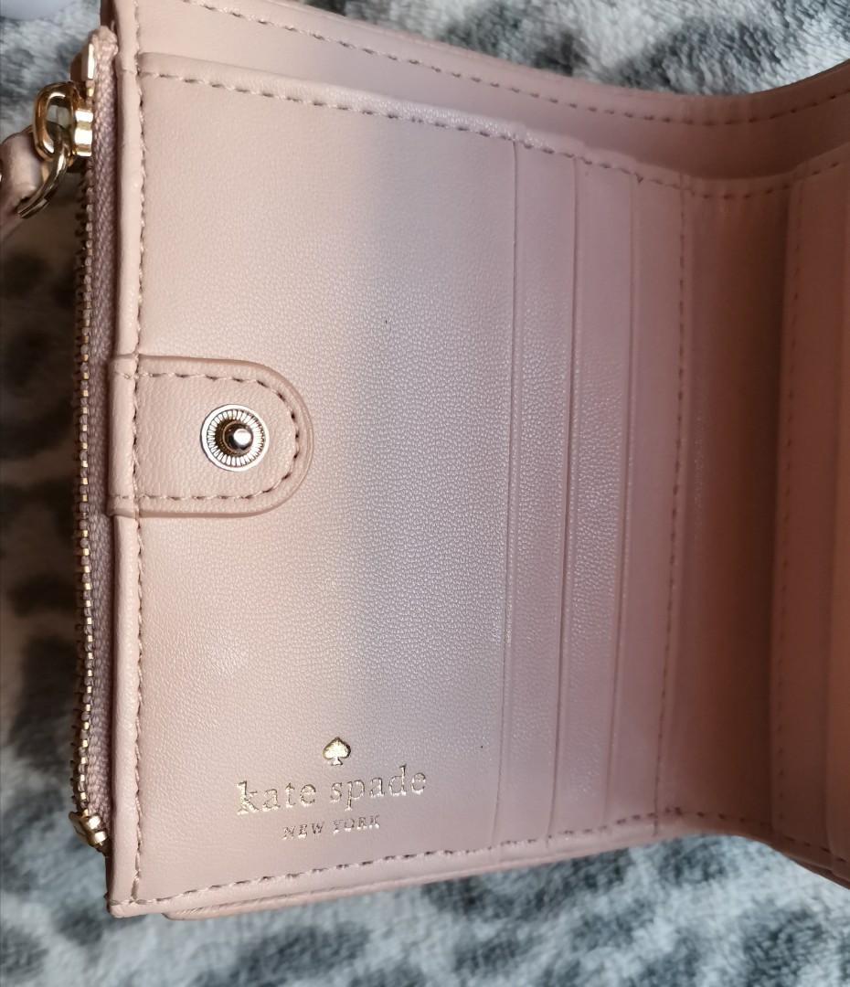 Kate Spade Malea wallet (Category: Wallets & Card holders) located in Paranaque City. Submitted by kgcbien (Listing ID 278846943, Image 2). Description: Kate Spade Malea wallet in warmvellum condition: 7/10 (please see picture for the issues) very good in actual.