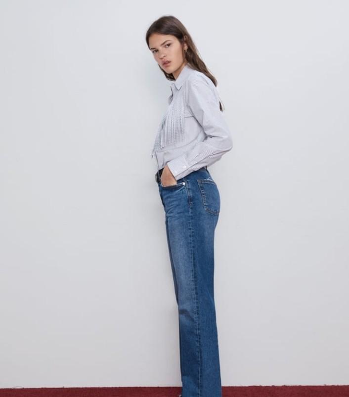 Zara Poplin Blouse Fringe Front (Category: Blouses) located in Makati City. Submitted by fromthetreasury (Listing ID 278849203, Image 3). Description: Collared long-sleeved polo with fringe appliques. Button-up front covered by a placket. Cowgirl look. Color: Ecru/Black.