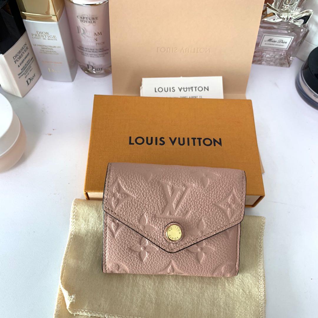 Authentic Louis Vuitton Pink Monogram Empreinte Leather Zoe Wallet
