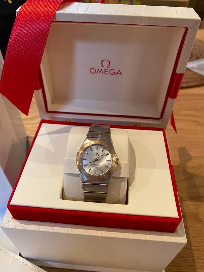 Omega Constellation (Category: Watches) located in Singapore. Submitted by og888 (Listing ID 279001663, Image 3). Description: Condition: 9/10 ( minor abrasion - not for fussy buyers) 27mm ( closed to 28mm look) - brushed solid 18k yellow gold bezel - 2 years warranty from 23 sept 2019 - battery operated quartz movement - certificate of authenticity - brushed with stainless steel case - brushed stainless steel with polished 18k yellow gold bracel