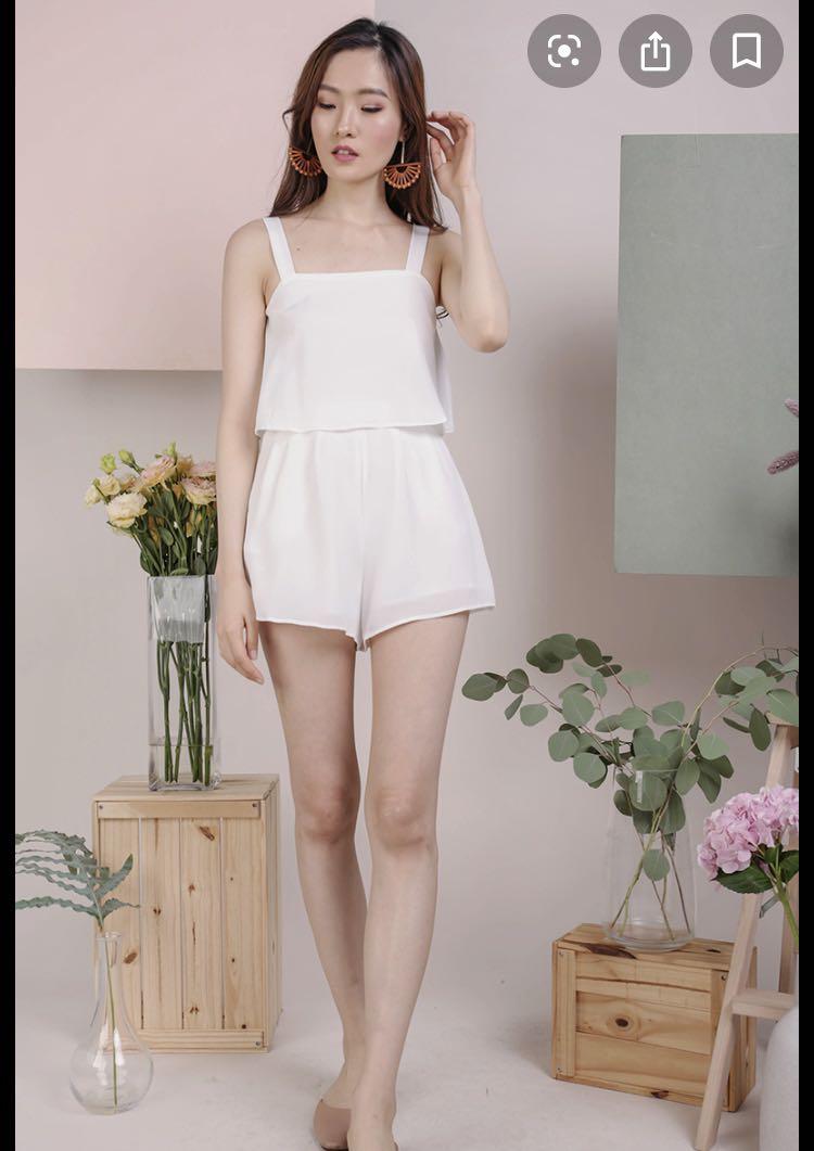 *PREMIUM* BNWT TTR NIXON FLARE ROMPER (White) (Category: Rompers) located in Singapore. Submitted by urbanthreads (Listing ID 279041543, Image 1). Description: Super pretty and comfortable fit! Made of polyester material. Inner lined. Concealed back zip. *QUALITY ASSURED* Size XL (but fits usual size L) Ptp: 17.5" High Waist: 15.5" Hips: 21.5" Rise: 16" Leg Opening: 16" Length: 31" Brand new with tag! (Retail price $40.90) Tinselrack tinsel rack 
