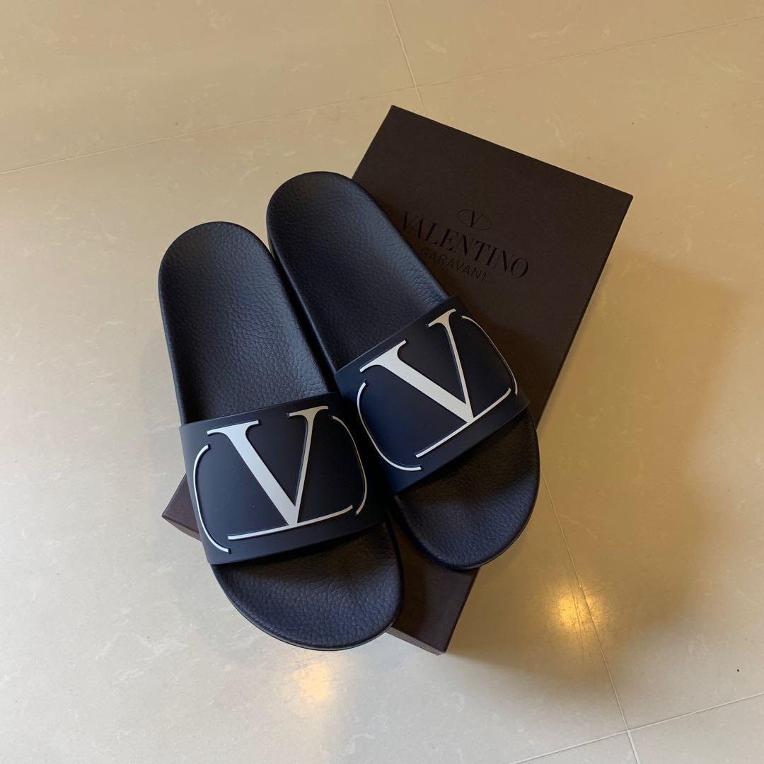 Valentino logo store slides