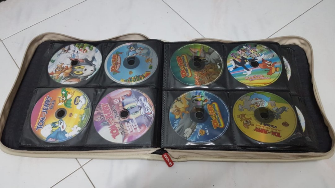 50+ CD of Mickey mouse club, scooby doo, Tom and jerry, Computers