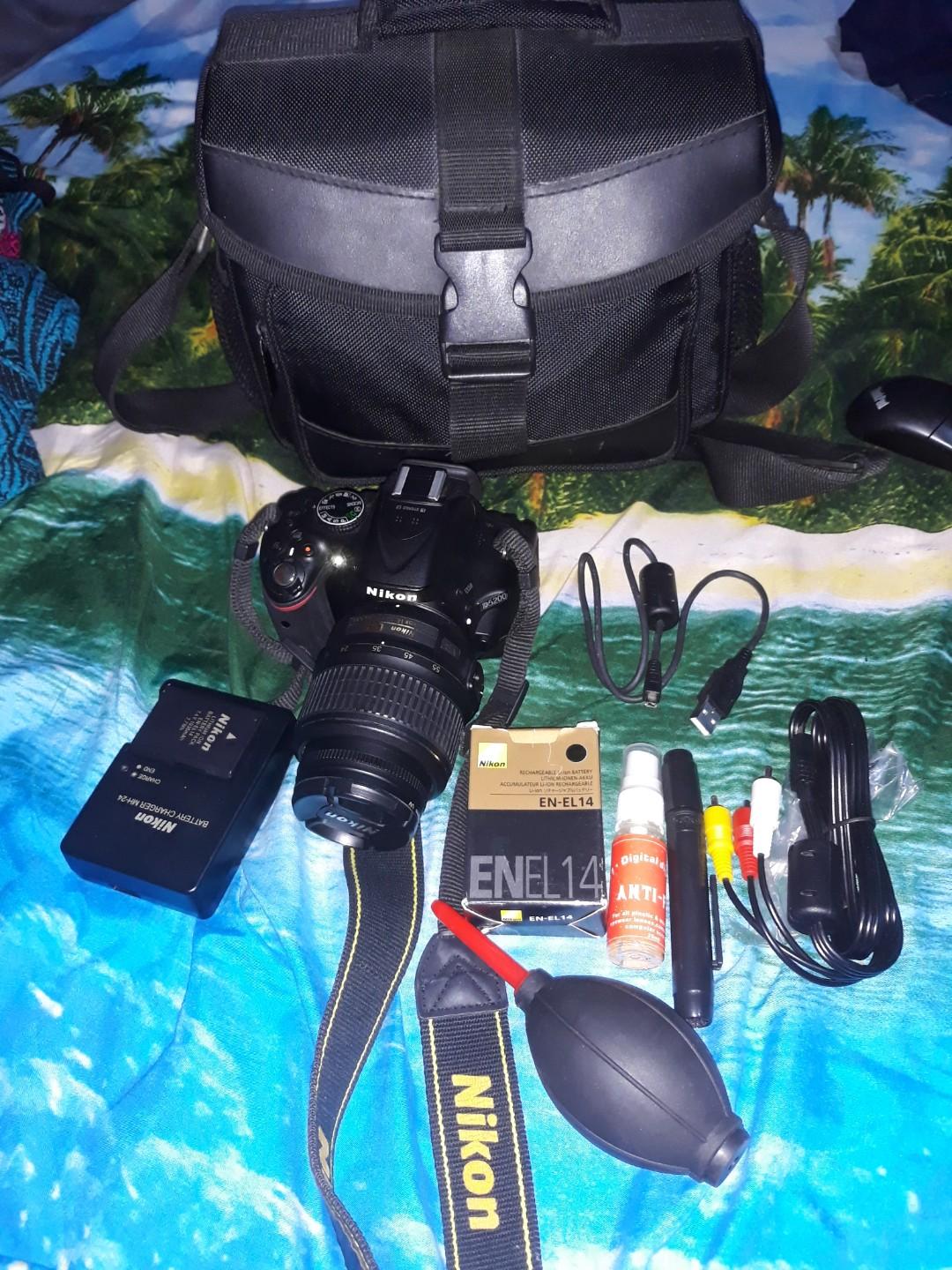 Nikon D5200 Camera (Category: Cameras) located in San Juan City. Submitted by vhanzmonzie (Listing ID 279384930, Image 2). Description: Slightly used. Comes with : bag Extra battery Camera itself Tripod Cable connector SD card.