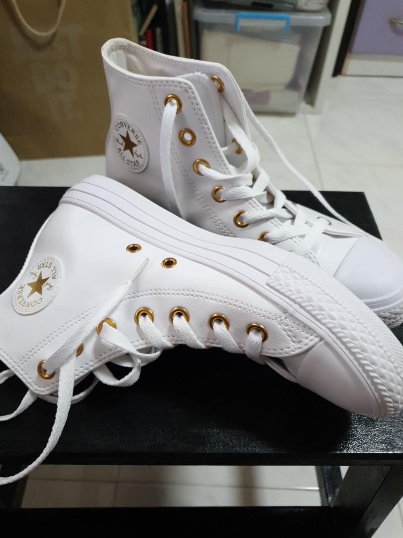 converse with gold eyelets