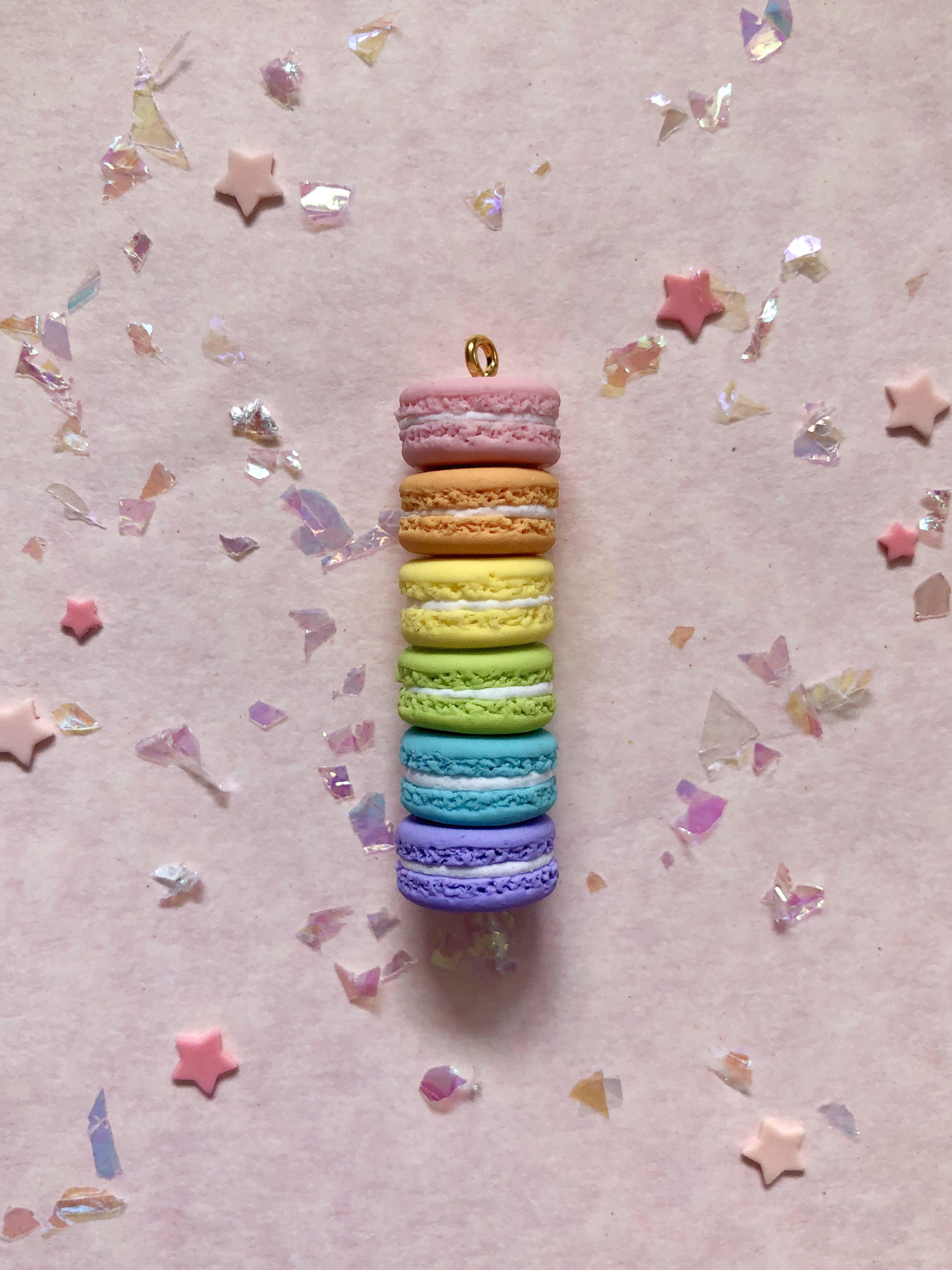 Rainbow Macaron Stack Keychain (Category: Handmade Craft) located in Singapore. Submitted by shuningnong (Listing ID 279830113, Image 2). Description: • handmade with air dry clay • will be glazed to protect the charm from scratches and dirt • cellphone strap will be added upon purchase to turn the item into a keychain attachment: • bow --> +$1.00 note: bow colour can be varied, please send a message for more information :) although steps have be