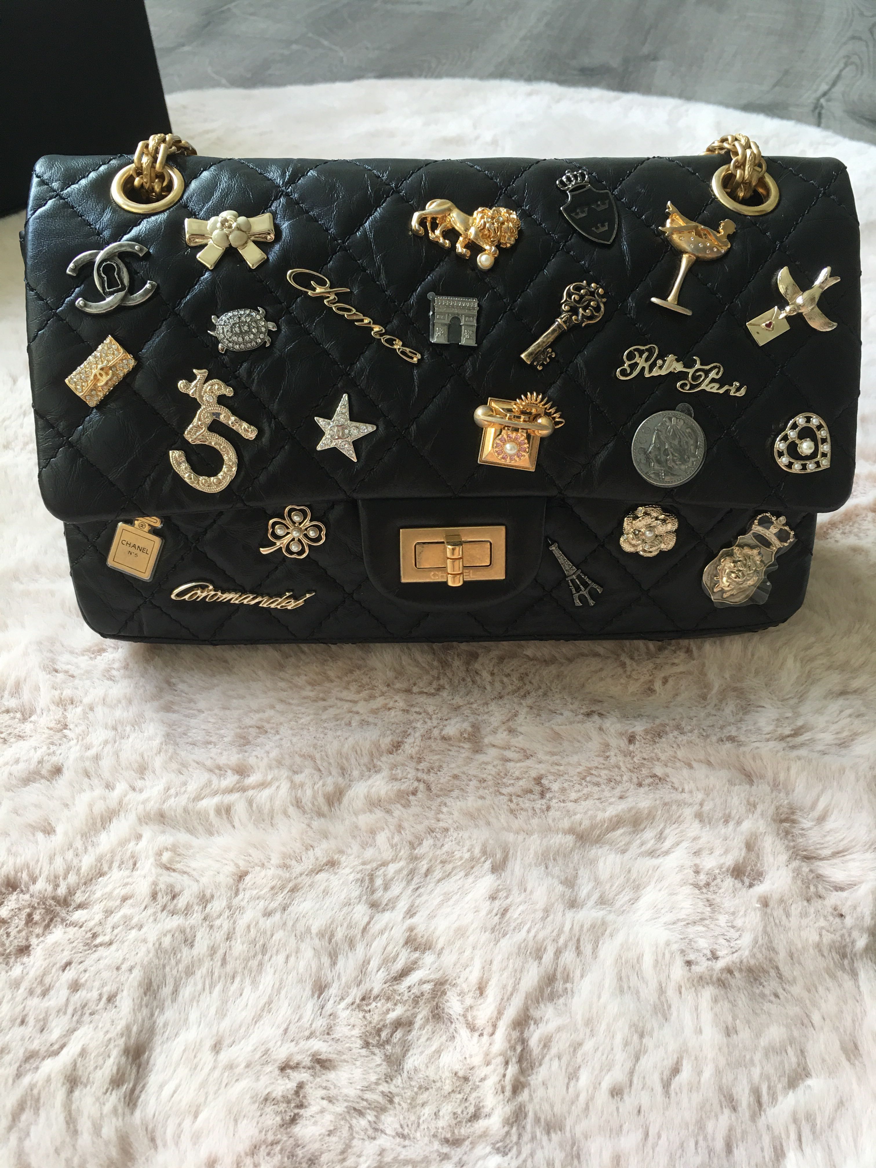 Chanel Black Quilted Aged Calfskin ParisCosmopolite Lucky Charms 224  Reissue Double Flap Brushed Gold Hardware 2017 Available For Immediate  Sale At Sothebys