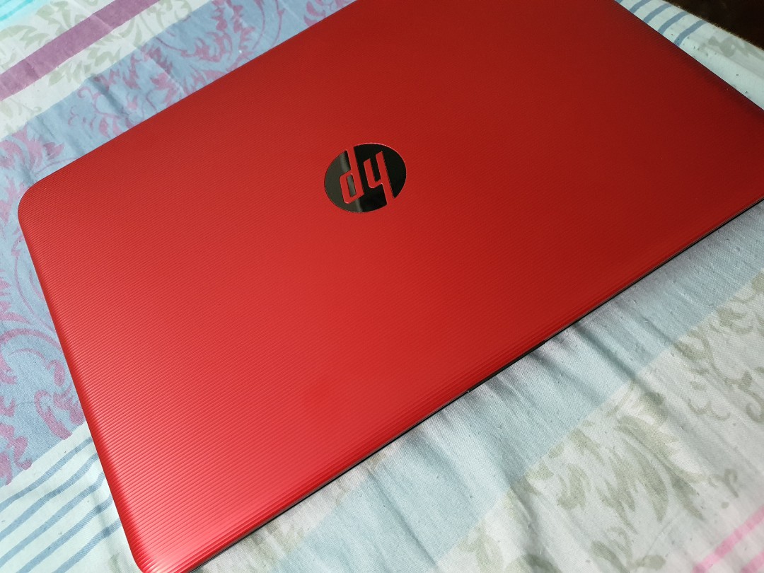 HP laptop red HP 14-AM103TX 7th Gen intel core i5 1 TB harddrive Windows 10  OS 14