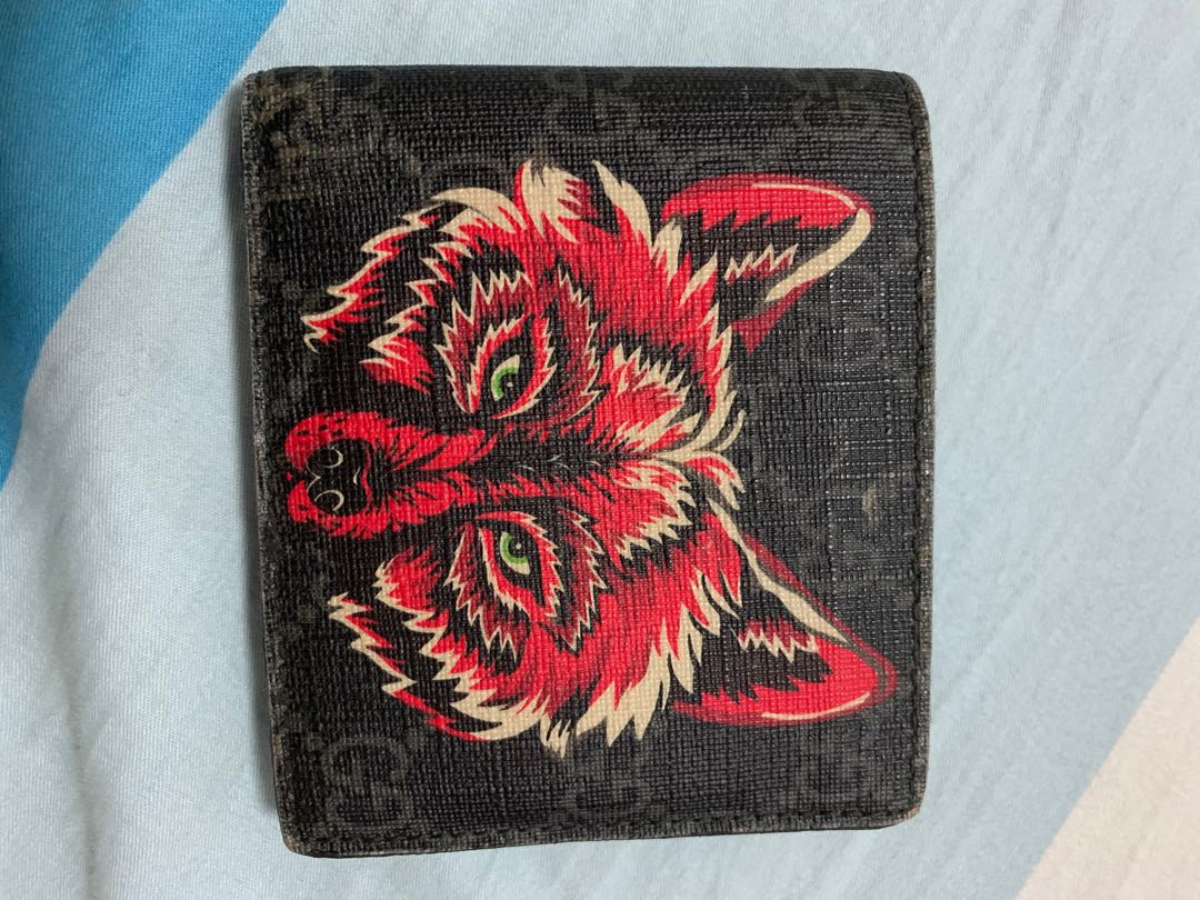 Gucci wallet wolf top