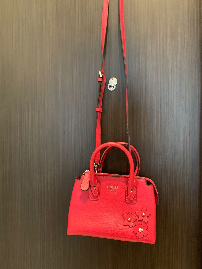 small red guess bag