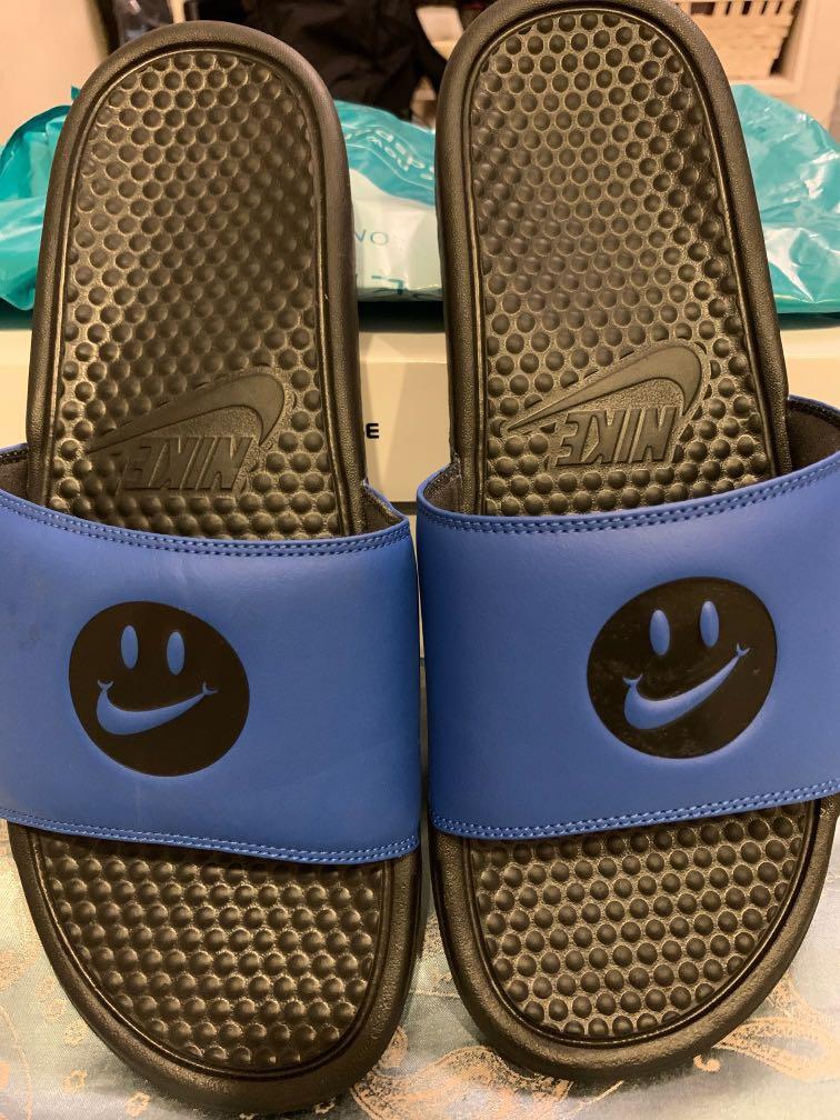 nike slides with smiley face