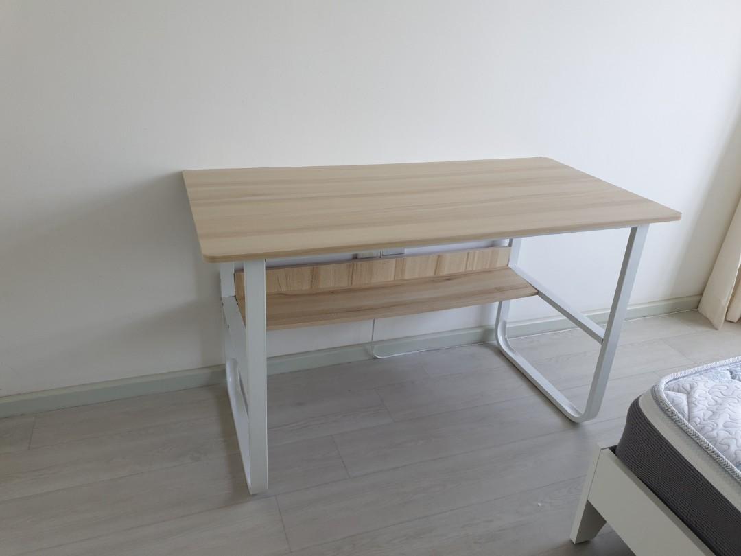 Study Desk (Category: Tables & Sets) located in Singapore. Submitted by marymc123 (Listing ID 280408099, Image 1). Description: Study desk for sale. Suitable for use as computer desk too. Condition: 8/10 Dimensions: 100x 50 x75cm Slight chip on top right corner as seen on picture 2. Can negotiate but please dont low ball. Self pick up at tiong bahru area..