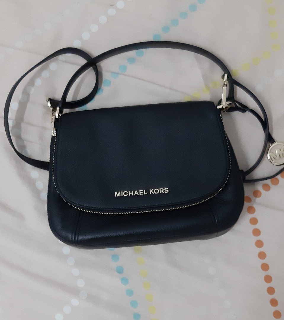 harga sling bag michael kors