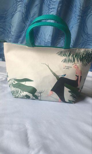 Green and white tote bag