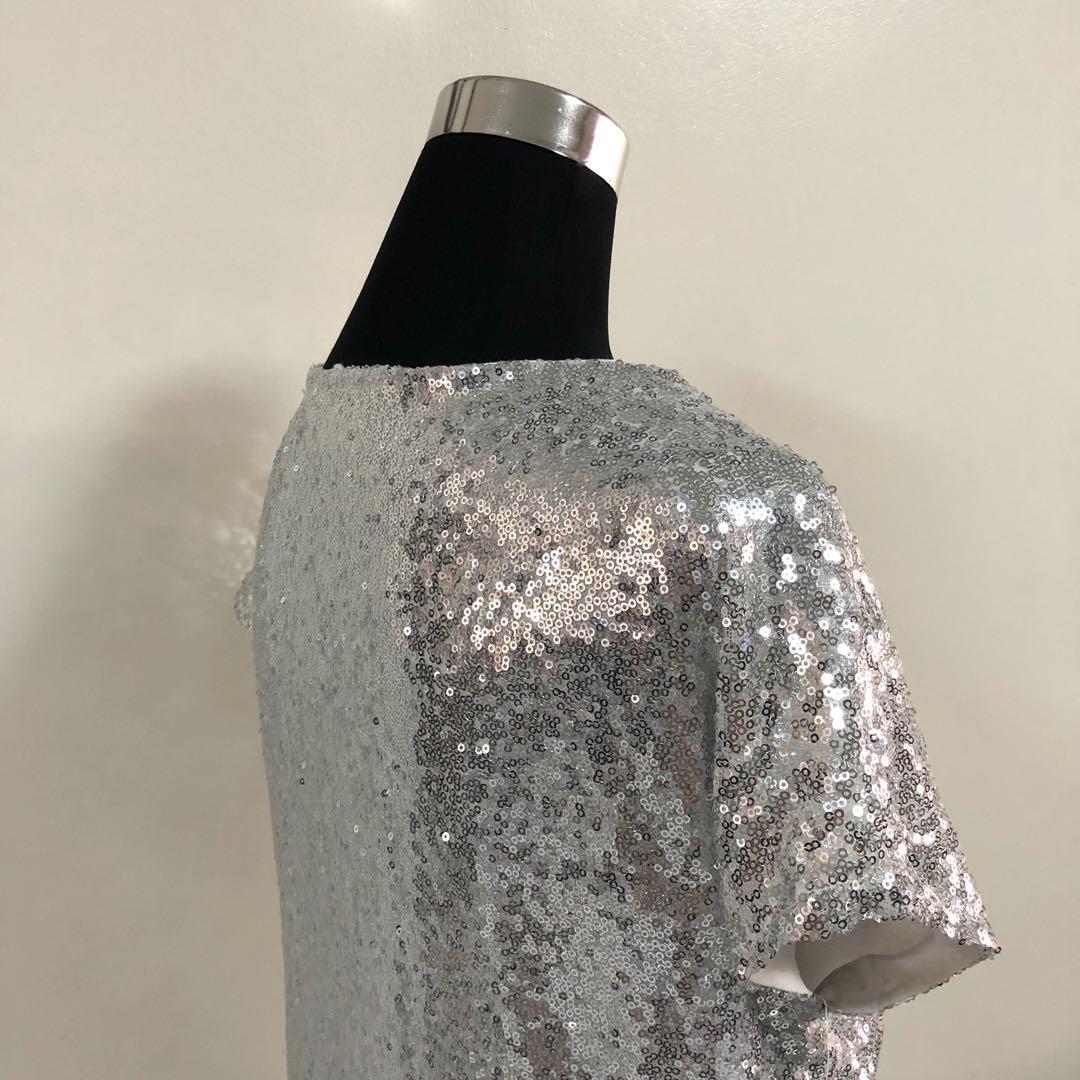 Freesize sequin dress (Category: Dresses) located in Marikina City. Submitted by mpaurf (Listing ID 280884696, Image 3). Description: ▪️(Personal) preloved item. Used once ▪️Silver ▪️ Size: Can fit up to L ▪️ Condition: 10/10 ▪️ Shipping via Fastrack, J&T, Lalamove or Grab ▪️Meet-ups in Marikina area ▪️MOPs: Gcash, BDO, Cebuana or Palawan.