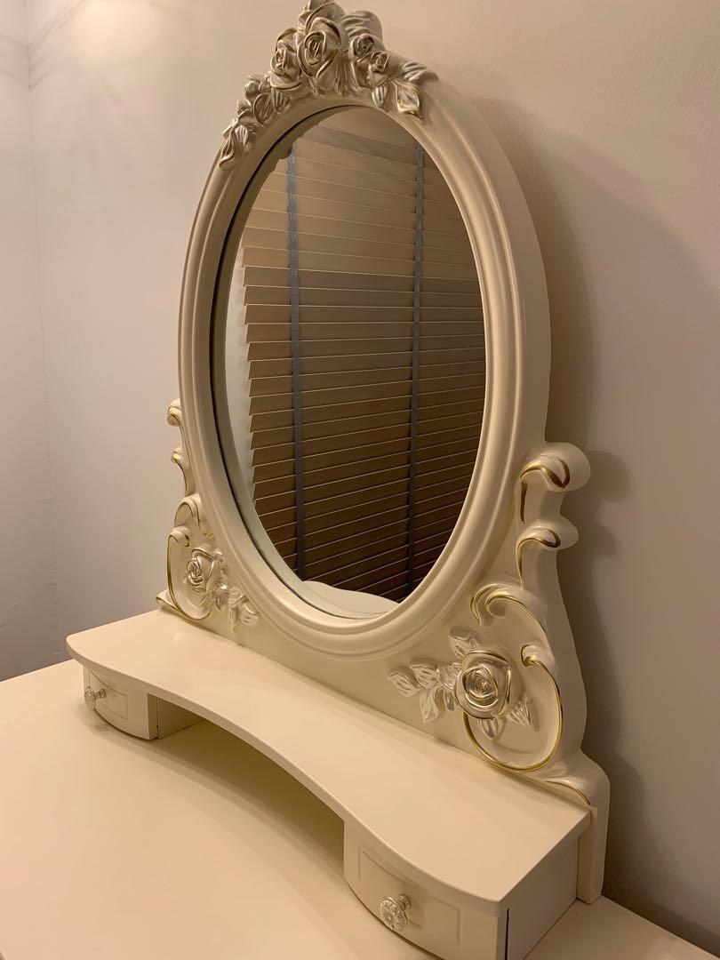 antique dressing table with round mirror
