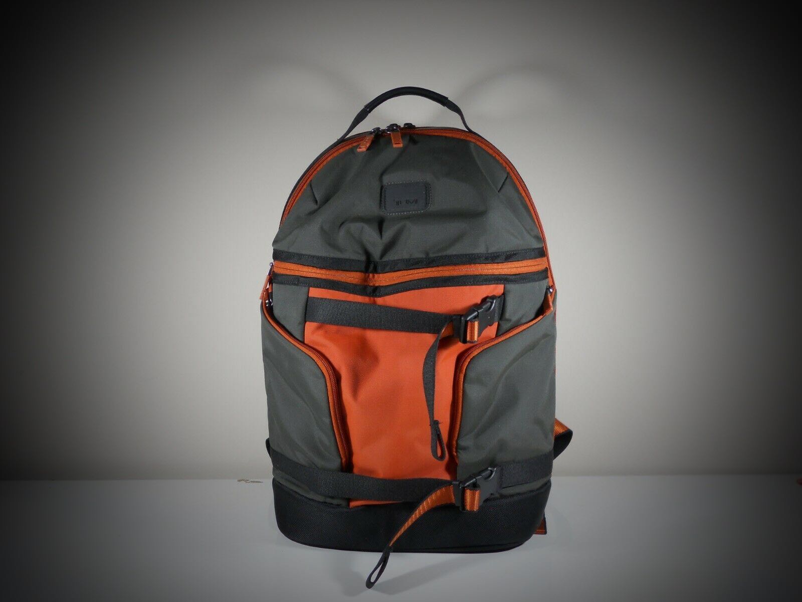 tumi orange backpack