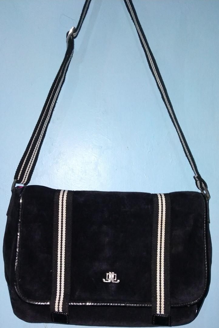 Authentic JLO Messenger Bag (Category: Cross-body Bags) located in Quezon City. Submitted by andrethyzpicks (Listing ID 281159668, Image 1). Description: Authentic JLO bag from abroad Gift from a friend Barely used ( not my style) Good as new 1 internal pocket with zipper 2 small internal pocket A bit dusty since it was kept in a box #messengerbag Last price posted All photos are shown above No cancelation of order No meet up No return no exchang