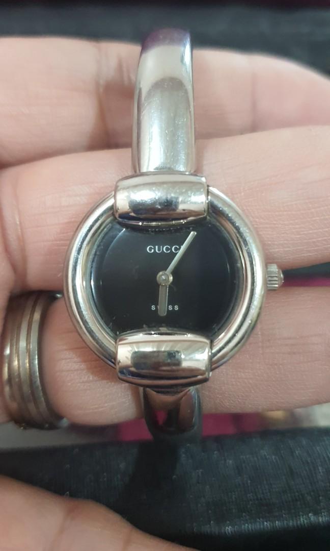 Vintage Gucci Watch (Category: Women's Watches) located in Makati City. Submitted by jonnaski (Listing ID 281159083, Image 1). Description: Model Name: Vintage Gucci 1400L Stainless Steel Ladies Quartz Watch Stainless Steel Round Case Measuring Approximately 25mm x 26mm, Without Crown And From Lug to Lug Plain Black Dial Silver Hands Stainless Steel Crown with Gucci Logo Original Crystal Plain Bezel Precise Gucci Quartz Movement Stainless Steel B