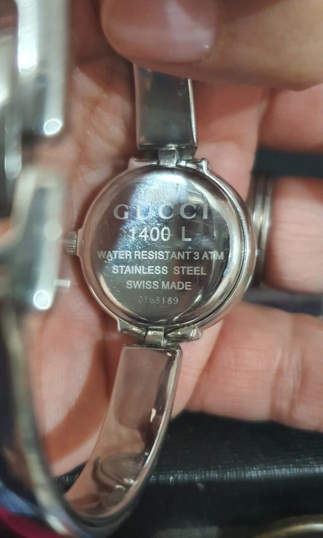 Vintage Gucci Watch (Category: Women's Watches) located in Makati City. Submitted by jonnaski (Listing ID 281159083, Image 2). Description: Model Name: Vintage Gucci 1400L Stainless Steel Ladies Quartz Watch Stainless Steel Round Case Measuring Approximately 25mm x 26mm, Without Crown And From Lug to Lug Plain Black Dial Silver Hands Stainless Steel Crown with Gucci Logo Original Crystal Plain Bezel Precise Gucci Quartz Movement Stainless Steel B