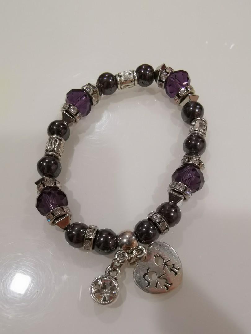 Assorted accessories (Category: Other Accessories) located in Singapore. Submitted by modestyinline (Listing ID 281483645, Image 6). Description: Assorted Bracelets & Rings 1 for $3 2 for $5 - Rose Gold Ring (Size 8) - Gold Ring (Size 7) - Blue Cat's Eye Bracelet - Black Beads with Girl Charm - Black Beads & Yellow Crystals with Heart Charm - Black Beads & Purple Crystals with Couple Heart Charm - Purple Crystal Bracelet with Heart Charm - Baby B