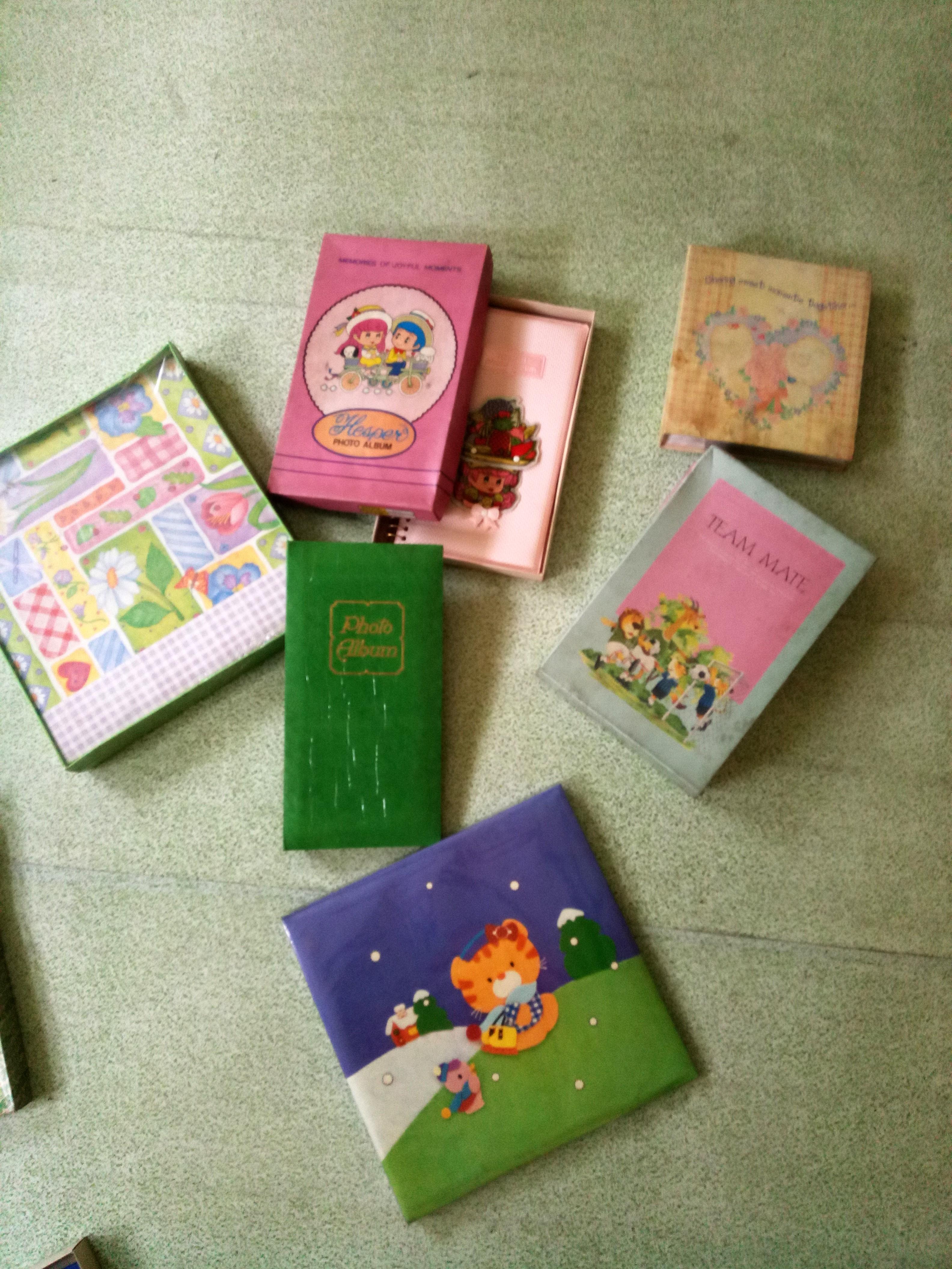 Photo albums take-all (Category: Stationery & School Supplies) located in Manila. Submitted by daisythejane (Listing ID 281333081, Image 1). Description: Take-all photo albums! Includes : Baby album Hesper pink album Flip-type album 5-in-1 sealed album Sealed family size album Two piggies design album Take-all deal for only P1k! That's P100 Lang each!.