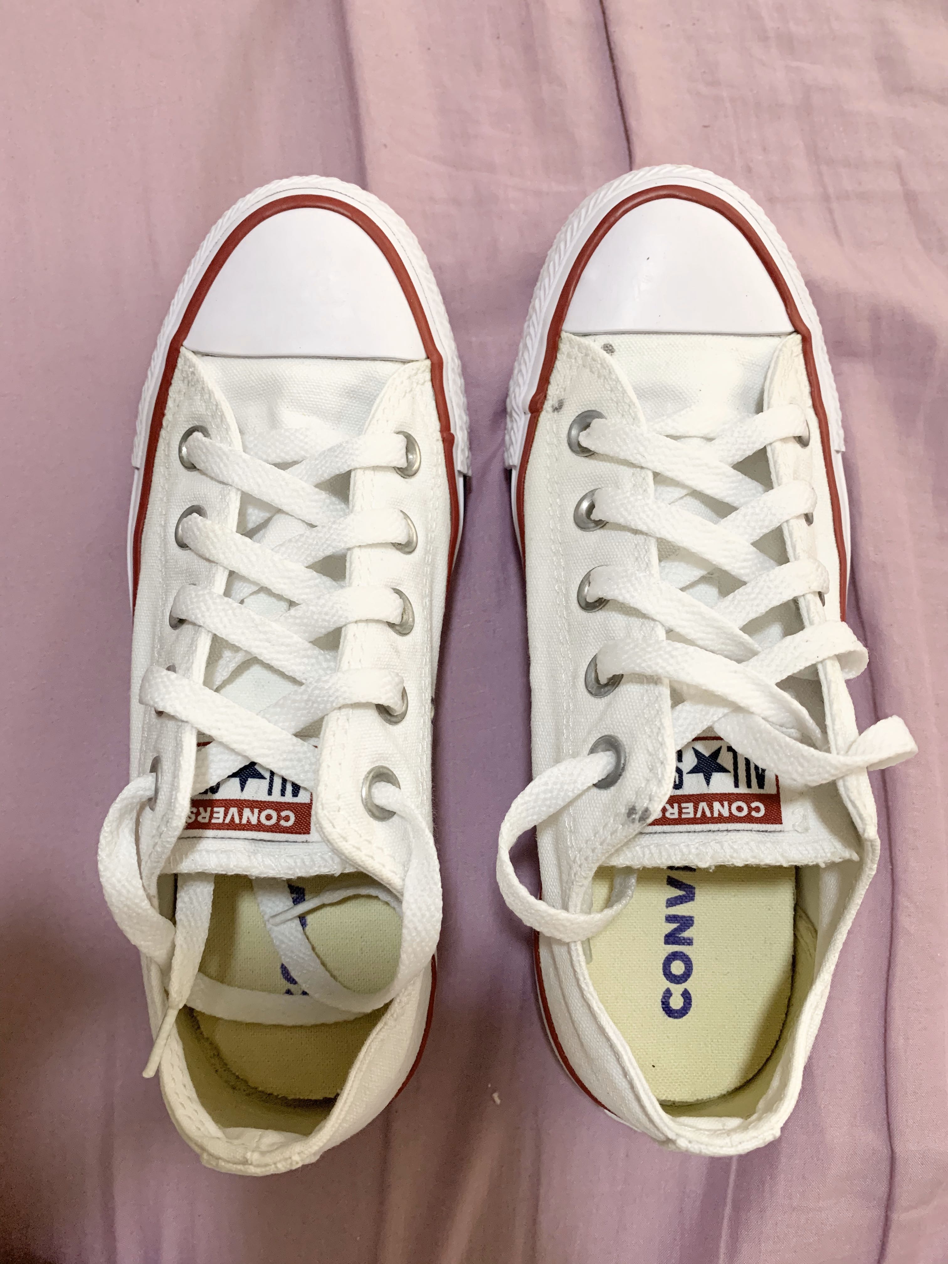 White Converse Chuck Taylor shoes Women s Fashion Footwear
