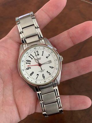 Casio beside watch