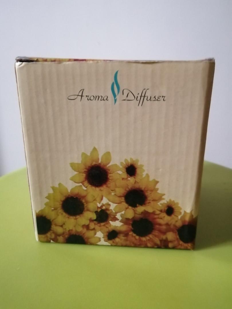 Aroma essense Diffuser (Category: Lighting) located in Singapore. Submitted by bluedanude (Listing ID 281818601, Image 3). Description: BNIB essence burner for yr home environment with design.Self collect only.Height 4" n circumference 3.5" Fragrance essence can be bought anywhere.coated ceramic inside n out,smoke mark can be wipe n clean off ez with wer cloth..