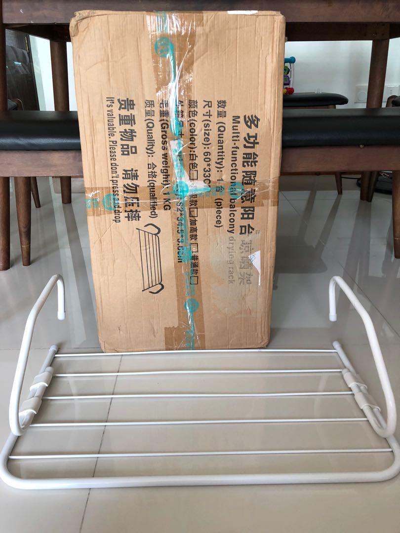 Drying Rack (Category: Bathroom & Kitchen Fixtures) located in Singapore. Submitted by happylivin (Listing ID 281736535, Image 1). Description: Balcony drying rack (new, opened js for photo taking) dimension 52x34.5x3.6cm space saving, good for hanging wet towels / shoes .