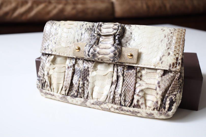 On Pedder snakeskin clutch