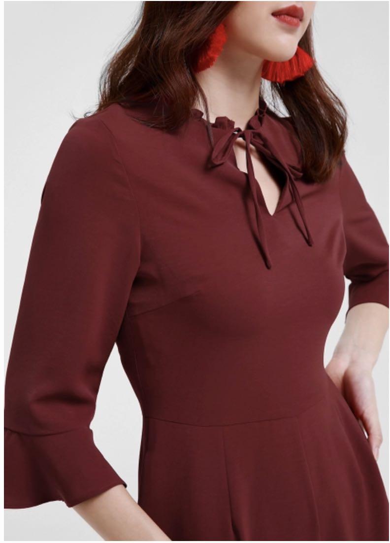 Maroon ruffle sleeve romper (Category: Rompers) located in Singapore. Submitted by fattydolly (Listing ID 282063243, Image 2). Description: With tag still on Free mailing .