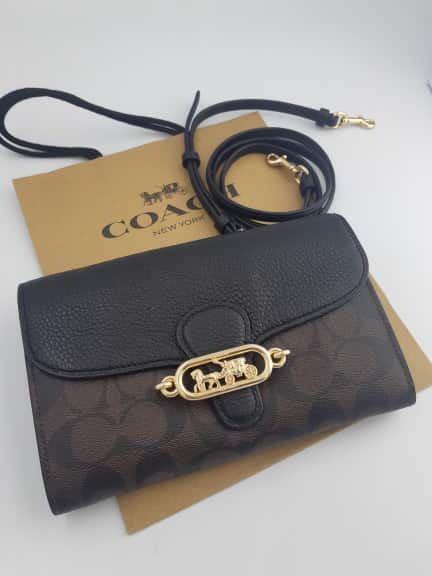 Coach wallet convertible sling (Category: Luxury Bags & Wallets) located in Paranaque City. Submitted by FLess.ph (Listing ID 282250708, Image 1). Description: Coach wallet convertible sling! Comes with coach paper bag! More detailed photos? Just PM me :) .