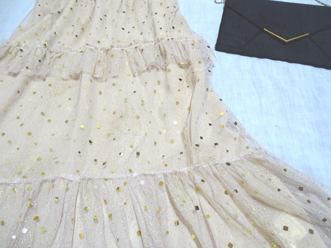 Korean Gold Mesh Dress (Category: Dresses) located in Muntinlupa City. Submitted by juanderfulliving (Listing ID 282231620, Image 2). Description: ✨Korean Gold Sequence Mesh Dress 👗 MAXI dress. With skin tone inner dress. Mesh on top layer. Gold sequence beaded. 🏷MINE + Any Emoji : PHP 250 📏Can fit from Small to Medium Frames ☑️Carefully curated Preloved dresses ☑️Washed. Ironed. No stain or damage ☑️Lowest Price Guaranted ☑️All items are on h