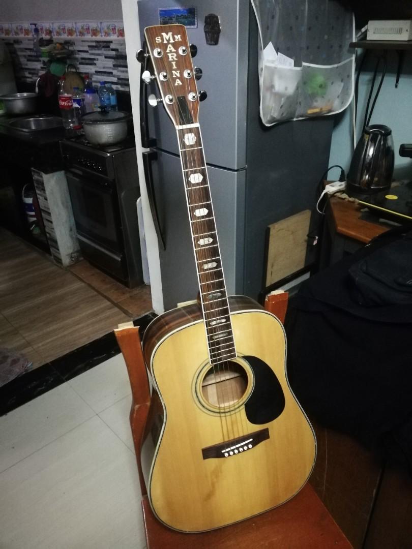Marina guitar price sales
