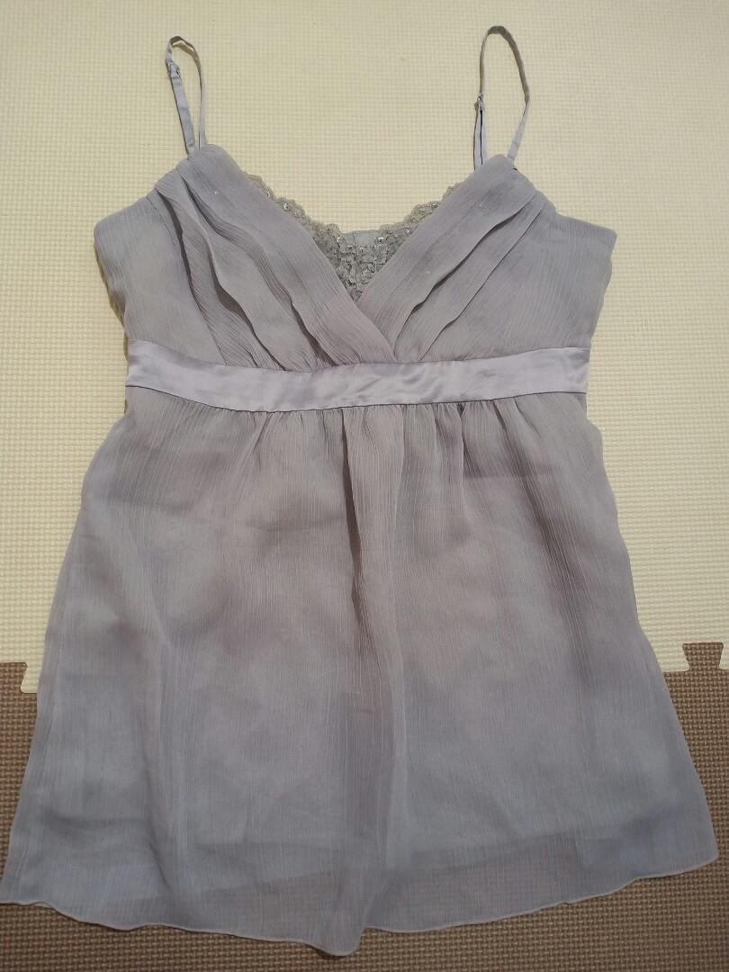 Sleeve less Top Blouse Esprit (Category: Blouses) located in Quezon City. Submitted by declutteringexcess (Listing ID 282555616, Image 3). Description: Still excellent conditon Grey in color with sequence accent n front Original Esprit brand Sf 75 within metro.