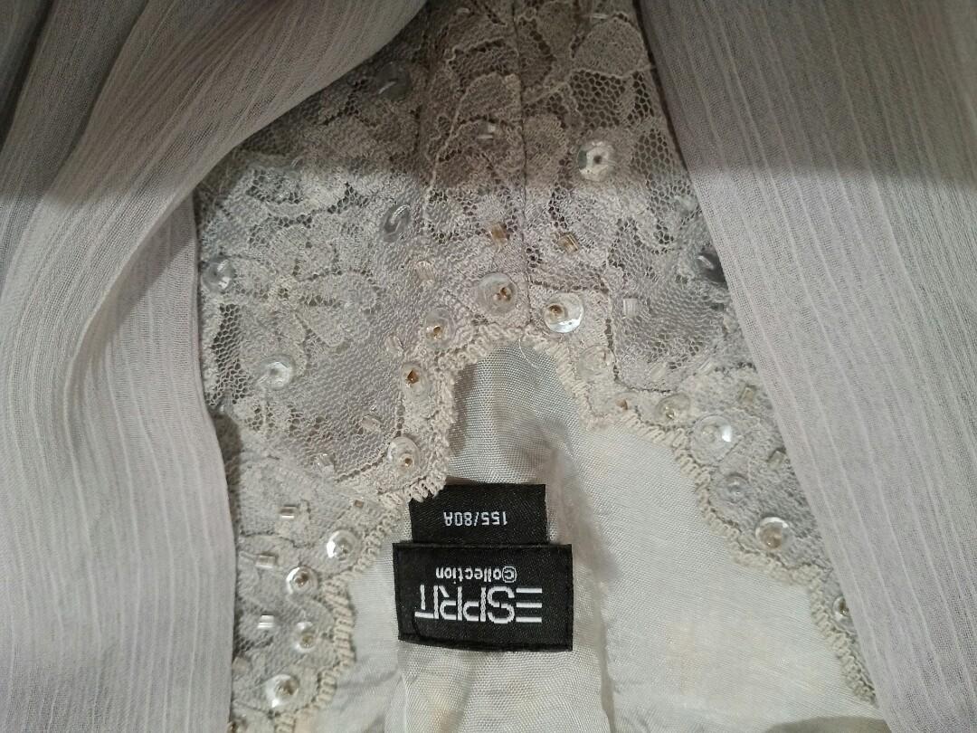 Sleeve less Top Blouse Esprit (Category: Blouses) located in Quezon City. Submitted by declutteringexcess (Listing ID 282555616, Image 1). Description: Still excellent conditon Grey in color with sequence accent n front Original Esprit brand Sf 75 within metro.