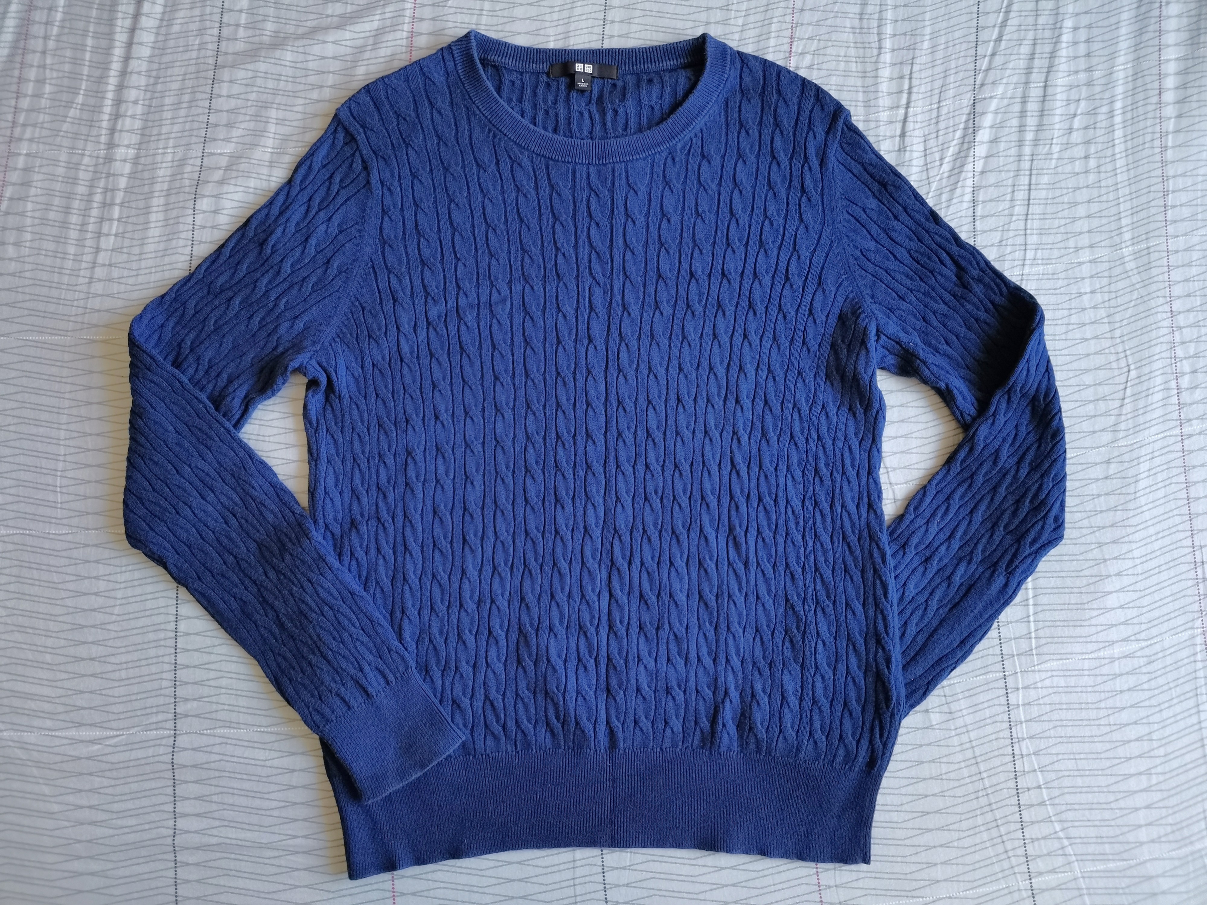 blue cable knit sweater