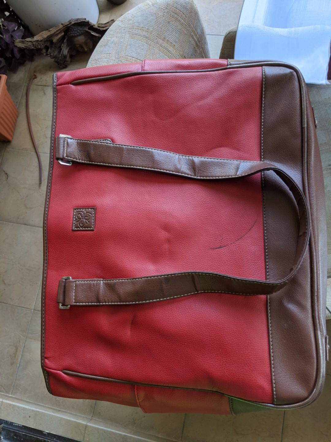 red leather laptop backpack