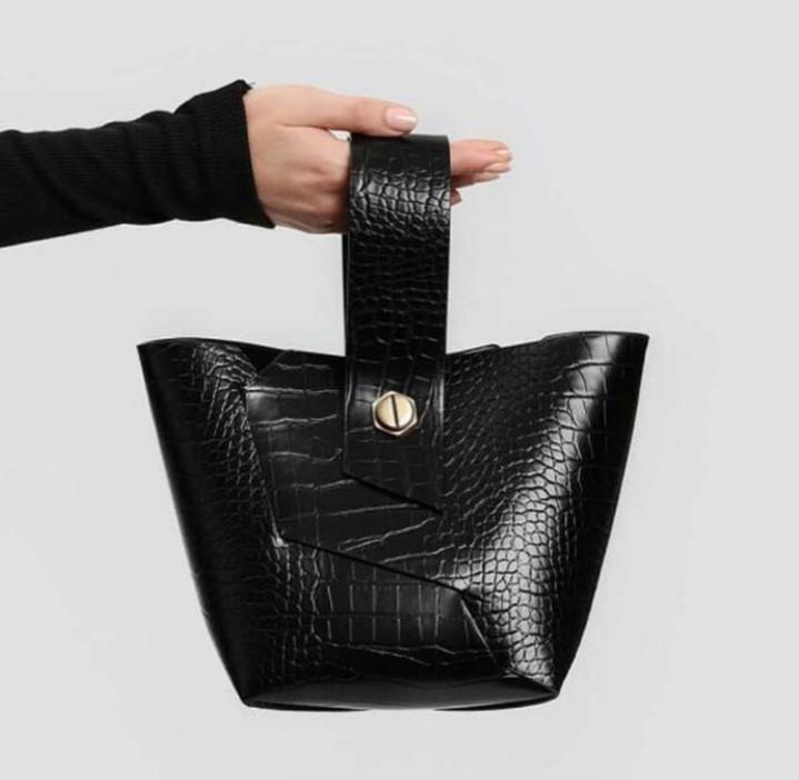 Authentic Charles and Keith Handle Wristlet Bucket Bag Women s Fashion Bags Wallets Purses Pouches on Carousell