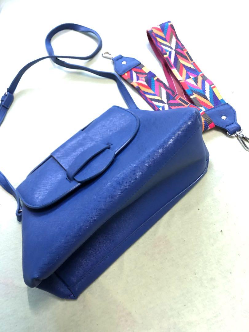 Blue Sling Bag (Category: Cross-body Bags) located in Manila. Submitted by toothless.project (Listing ID 283058912, Image 2). Description: Blue Sling with 2 Changeable Slings of your Choice. Prestine Condition, definitely not used. .