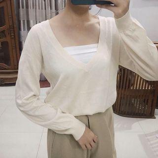 Beige sweater knitted