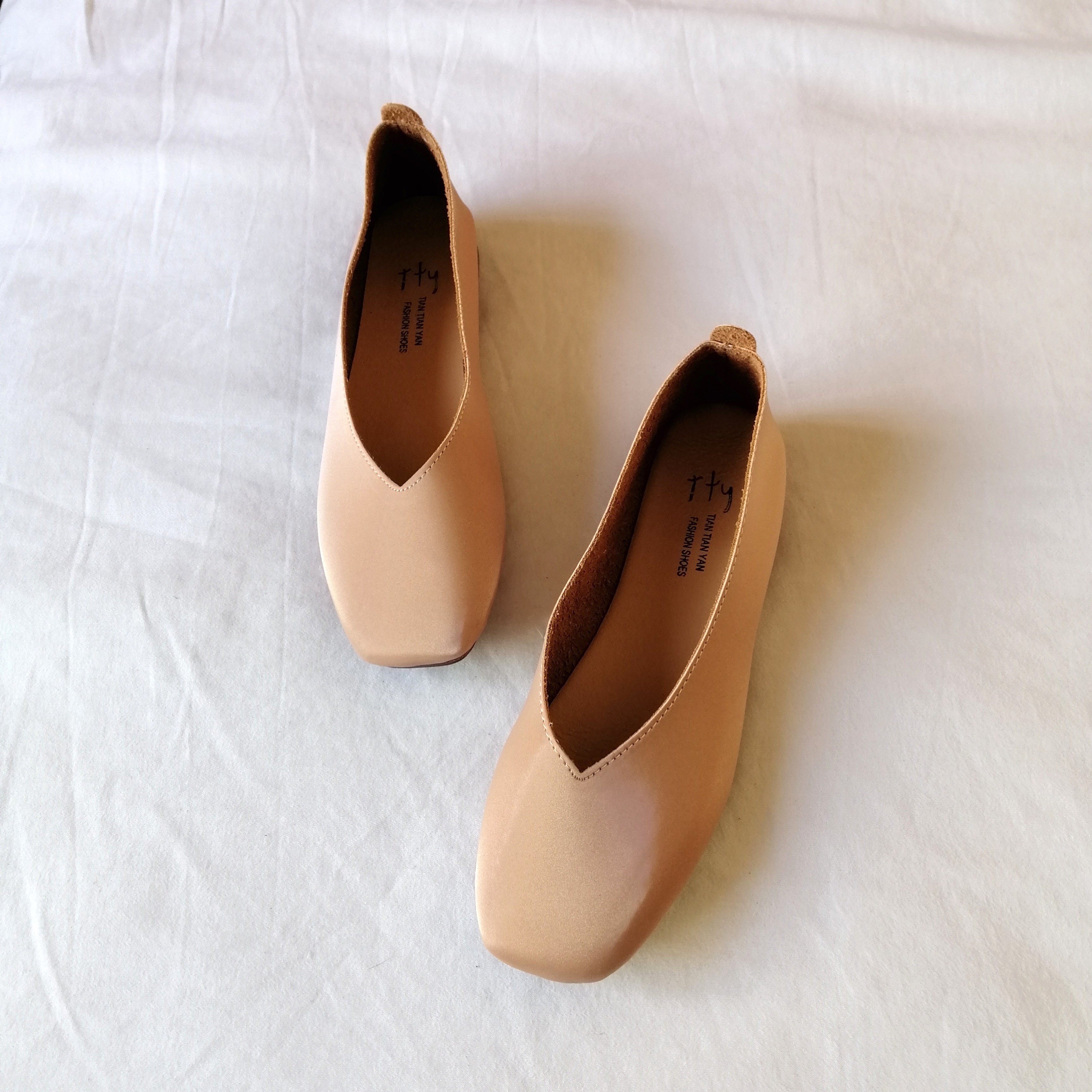 faux leather flats in champagne nude 