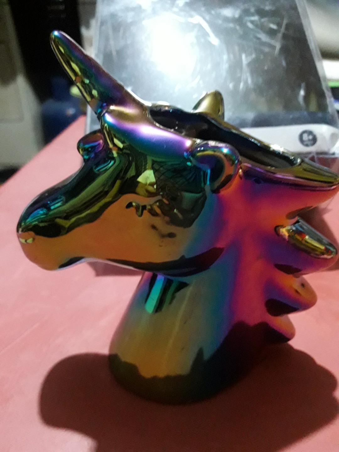 Unicorn Pen Holder (Category: Stationery & School Supplies) located in Las Pinas. Submitted by jaziyah4 (Listing ID 283679446, Image 1). Description: New but damage horn (fixed already by migthy bond). Ombre Unicorn Pen Holder. Color metallic rainbow. Material ceramic.