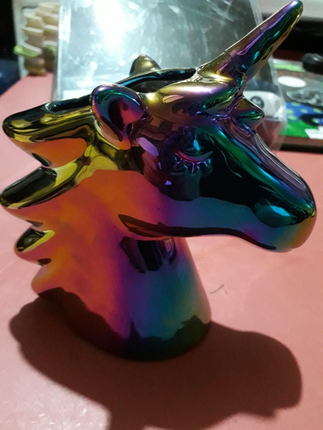 Unicorn Pen Holder (Category: Stationery & School Supplies) located in Las Pinas. Submitted by jaziyah4 (Listing ID 283679446, Image 2). Description: New but damage horn (fixed already by migthy bond). Ombre Unicorn Pen Holder. Color metallic rainbow. Material ceramic.