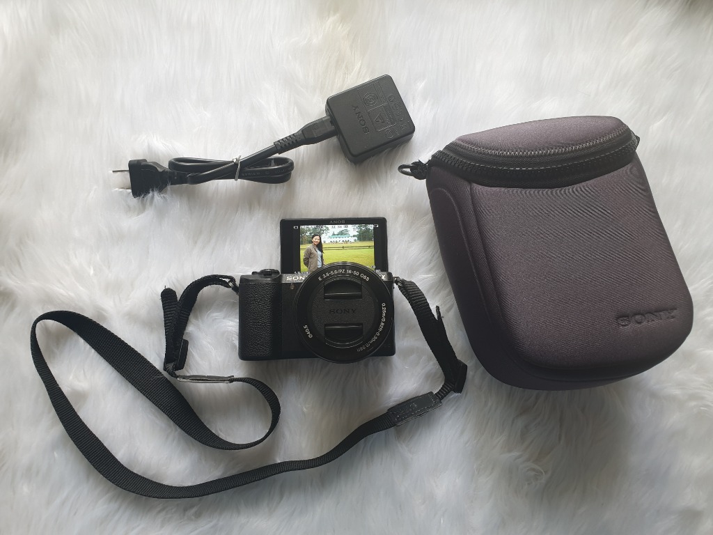 Sony ILCE5100L/B Alpha a5100 24.3MP HD 1080p Mirrorless Digital Camera with 16-50mm Lens (Black), 16GB Memory Card, Camera Bag