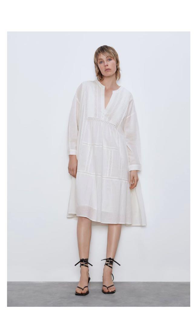 women's white embroidered dress